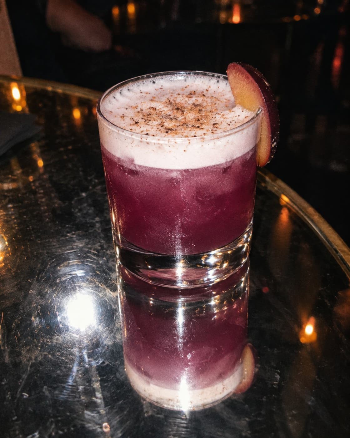 Zero-proof sugar plum amaretto sour, flash photo